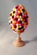 Яйцо Пасхальное украшенное фетровыми шариками на подставке